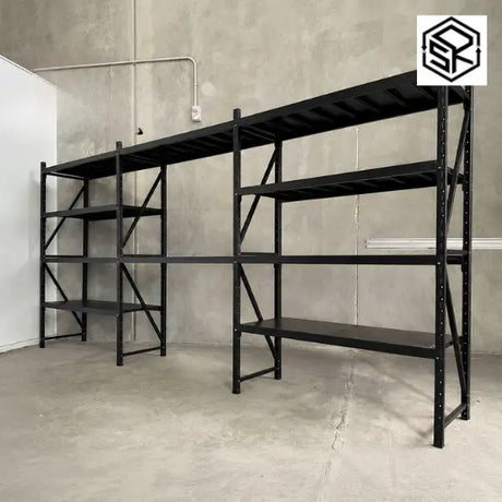 Heavy-duty metal shelving for organised garage and workshop storage.