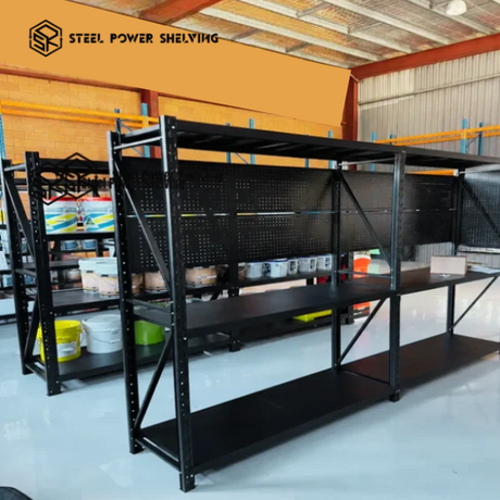 Steel Power shelving units arranged for stockroom storage